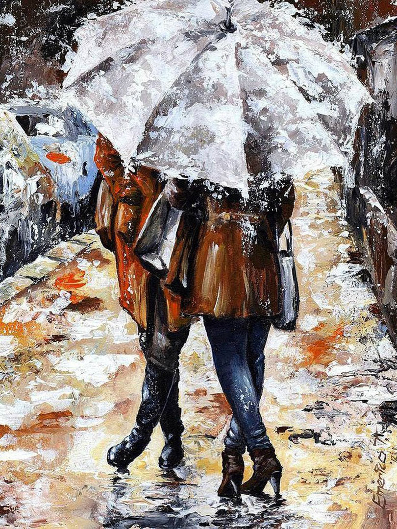 Влюблённые в снегопад с зонтом