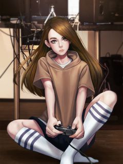 Девушка - геймер с геймпадом