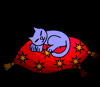 Киця, спящая на подушке