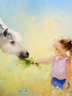 Девочка кормит лошадку