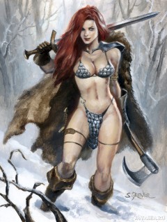 Сексуальная, полуобнаженная воительница в снегу